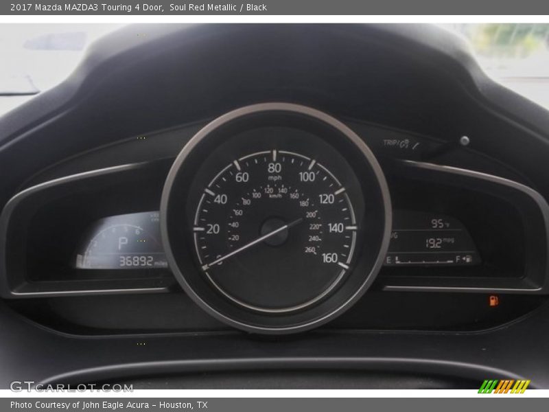 Soul Red Metallic / Black 2017 Mazda MAZDA3 Touring 4 Door