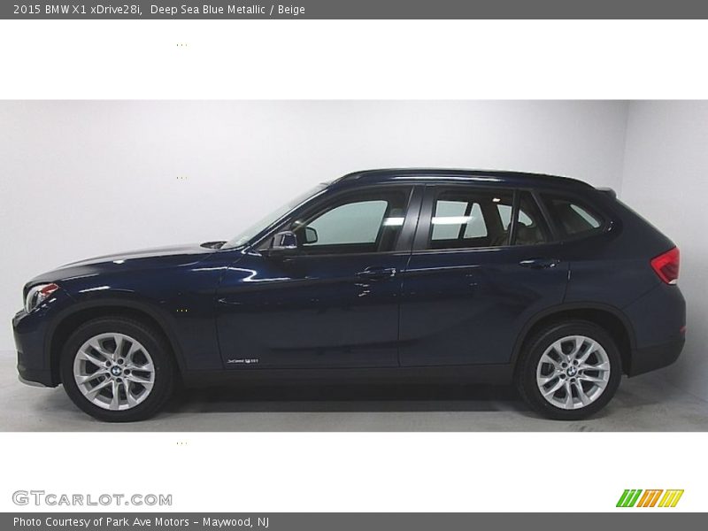Deep Sea Blue Metallic / Beige 2015 BMW X1 xDrive28i