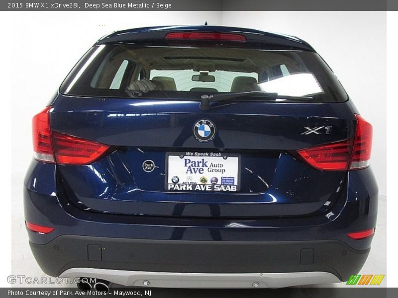 Deep Sea Blue Metallic / Beige 2015 BMW X1 xDrive28i