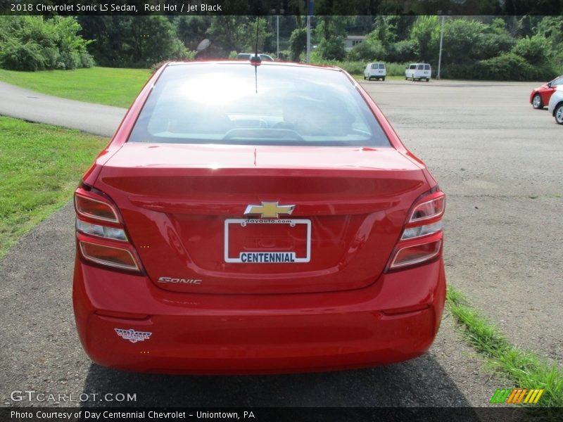 Red Hot / Jet Black 2018 Chevrolet Sonic LS Sedan