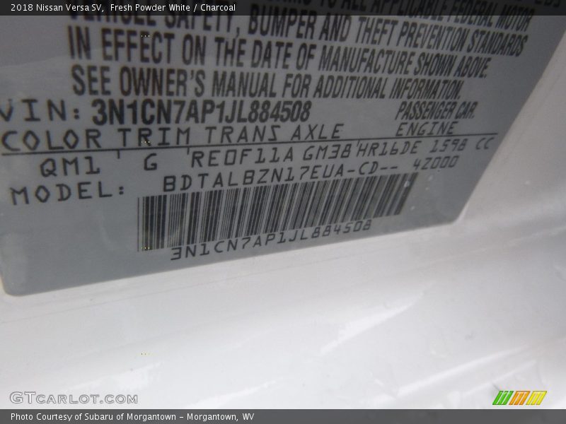 Fresh Powder White / Charcoal 2018 Nissan Versa SV