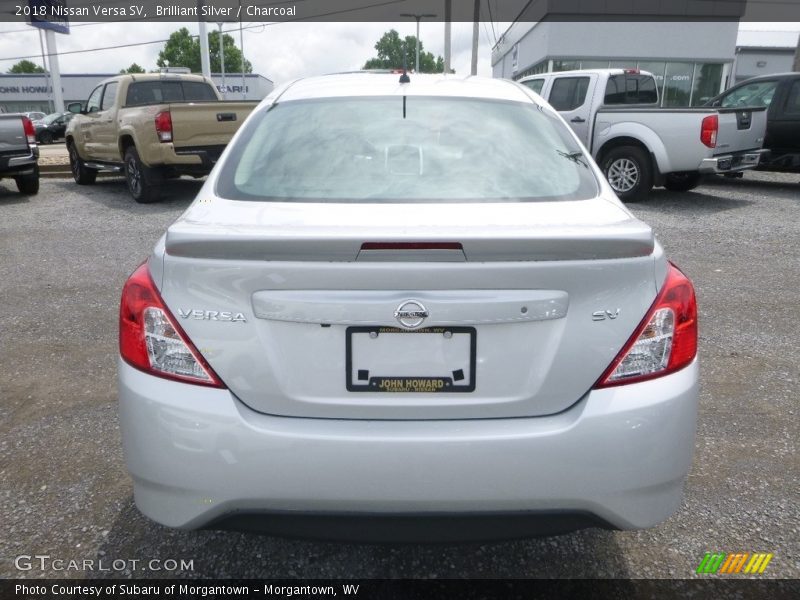 Brilliant Silver / Charcoal 2018 Nissan Versa SV