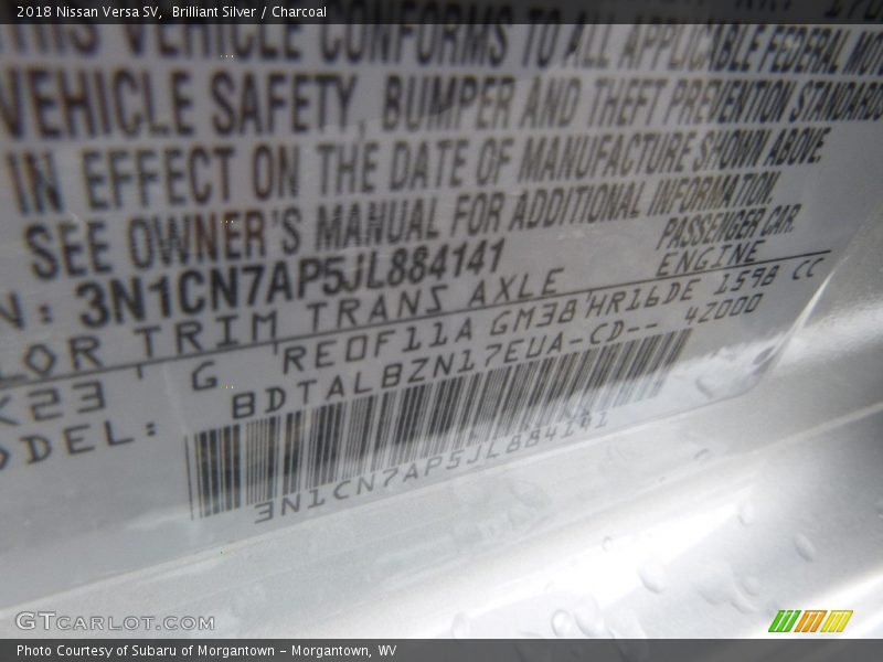 Brilliant Silver / Charcoal 2018 Nissan Versa SV