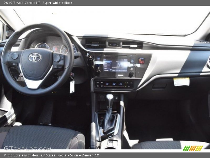 Super White / Black 2019 Toyota Corolla LE