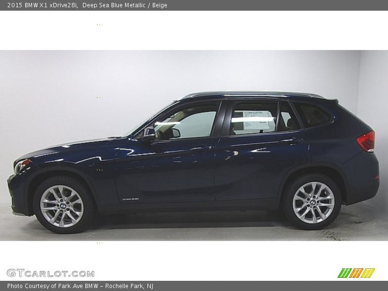 Deep Sea Blue Metallic / Beige 2015 BMW X1 xDrive28i