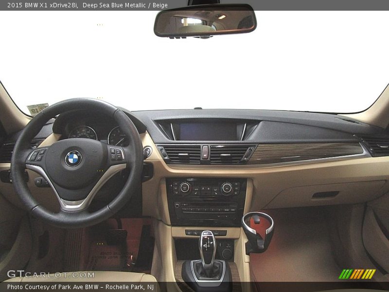Deep Sea Blue Metallic / Beige 2015 BMW X1 xDrive28i