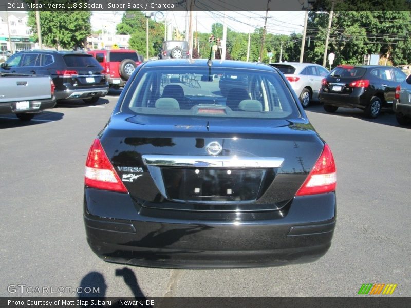 Super Black / Charcoal 2011 Nissan Versa 1.8 S Sedan
