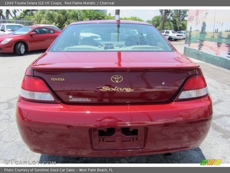 Red Flame Metallic / Charcoal 1999 Toyota Solara SLE V6 Coupe