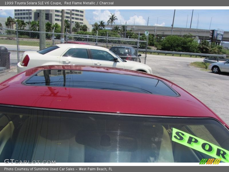 Red Flame Metallic / Charcoal 1999 Toyota Solara SLE V6 Coupe