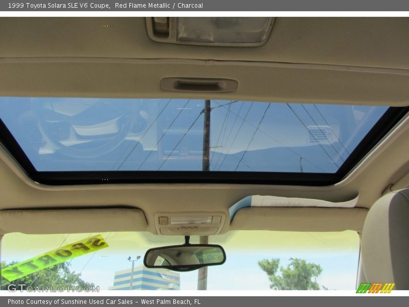 Red Flame Metallic / Charcoal 1999 Toyota Solara SLE V6 Coupe