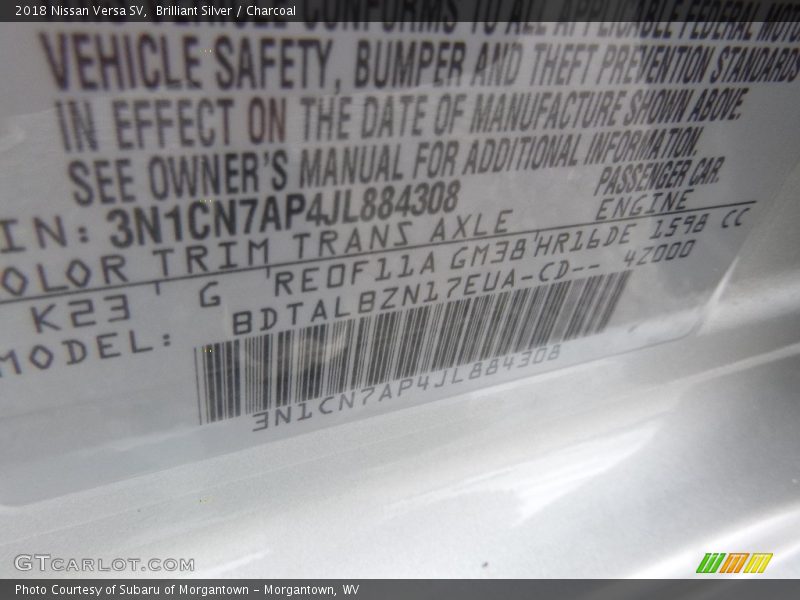 Brilliant Silver / Charcoal 2018 Nissan Versa SV