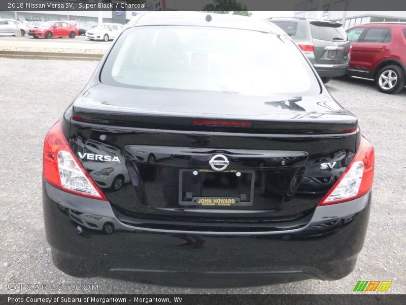 Super Black / Charcoal 2018 Nissan Versa SV