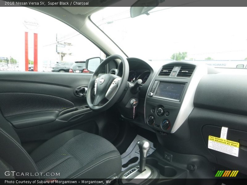 Super Black / Charcoal 2018 Nissan Versa SV
