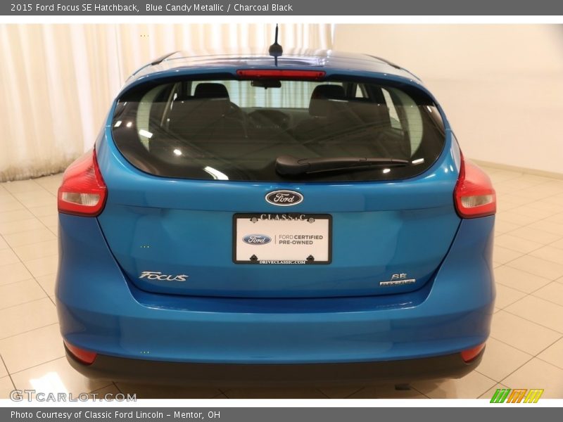 Blue Candy Metallic / Charcoal Black 2015 Ford Focus SE Hatchback