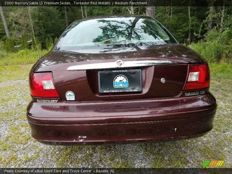 Toreador Red Metallic / Medium Parchment 2000 Mercury Sable LS Premium Sedan