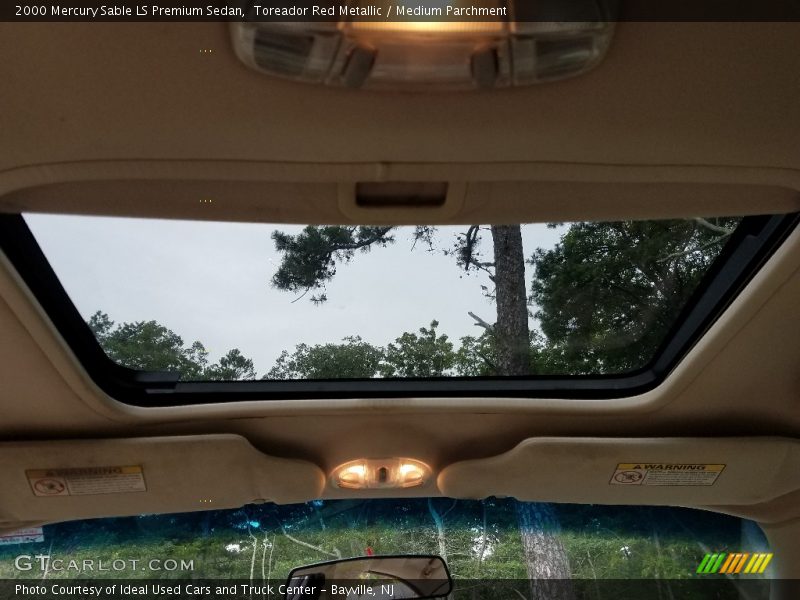 Toreador Red Metallic / Medium Parchment 2000 Mercury Sable LS Premium Sedan