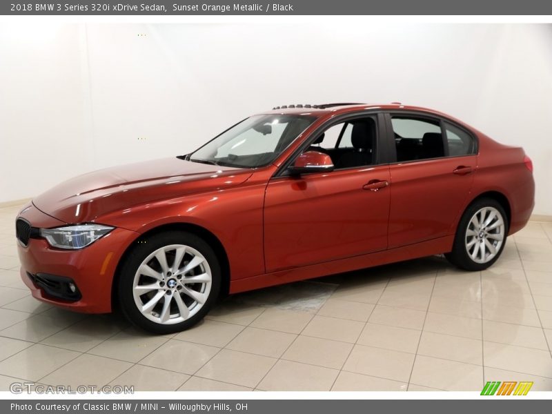 Sunset Orange Metallic / Black 2018 BMW 3 Series 320i xDrive Sedan