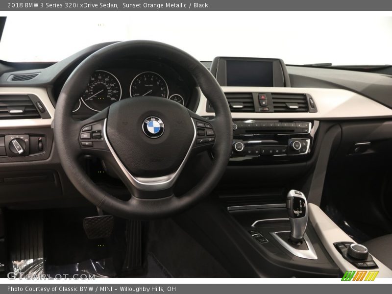 Sunset Orange Metallic / Black 2018 BMW 3 Series 320i xDrive Sedan