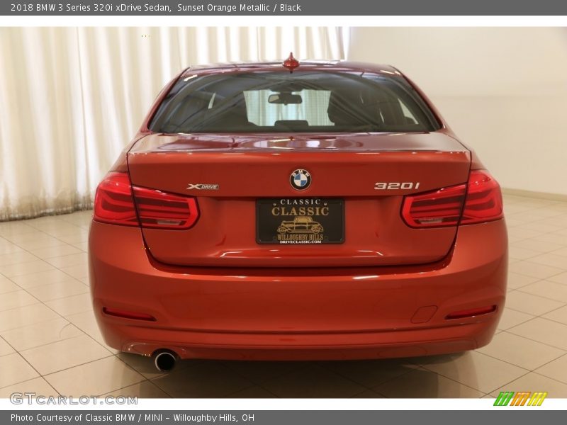 Sunset Orange Metallic / Black 2018 BMW 3 Series 320i xDrive Sedan