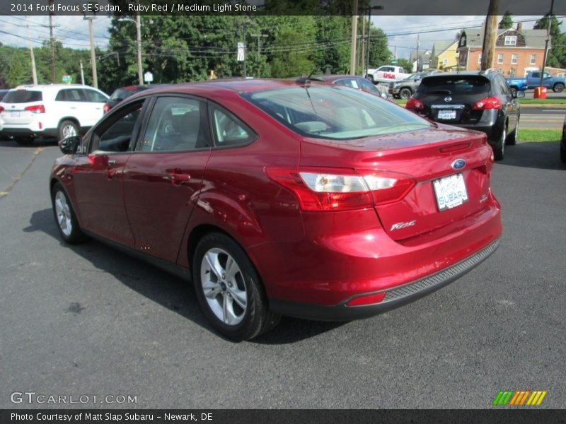 Ruby Red / Medium Light Stone 2014 Ford Focus SE Sedan