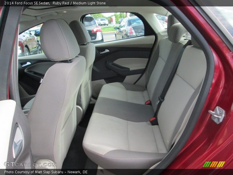 Ruby Red / Medium Light Stone 2014 Ford Focus SE Sedan