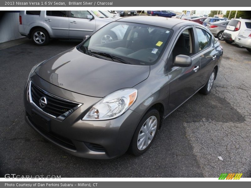 Brilliant Silver / Charcoal 2013 Nissan Versa 1.6 SV Sedan