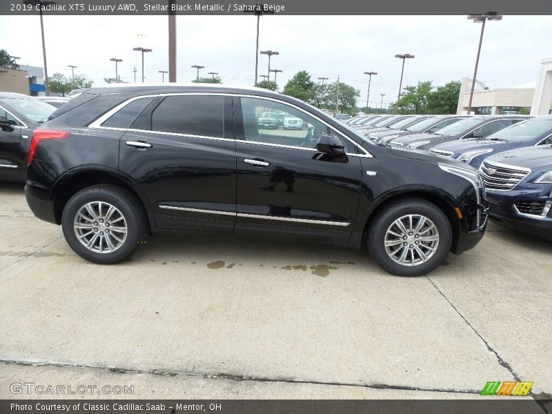 Stellar Black Metallic / Sahara Beige 2019 Cadillac XT5 Luxury AWD