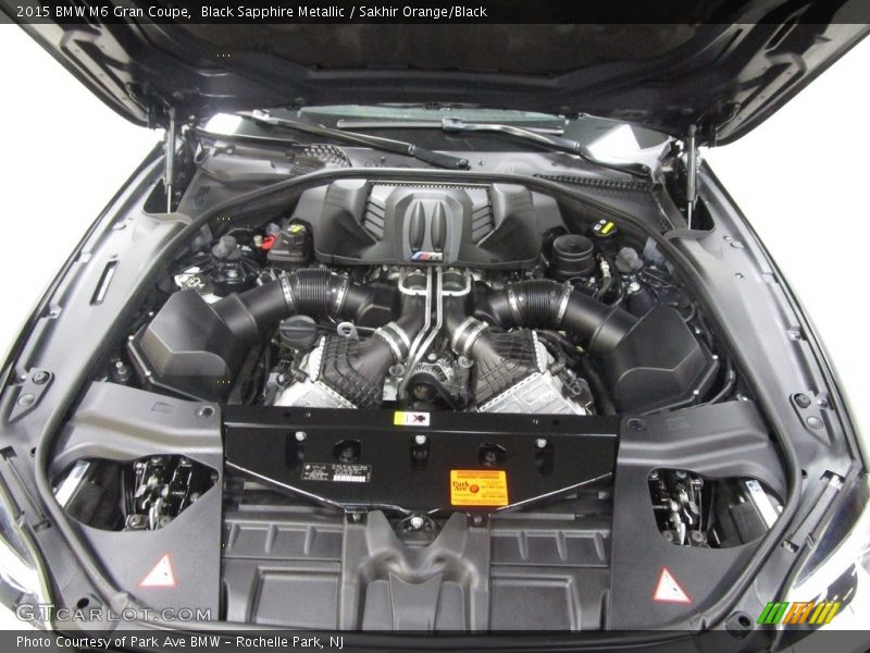 Black Sapphire Metallic / Sakhir Orange/Black 2015 BMW M6 Gran Coupe