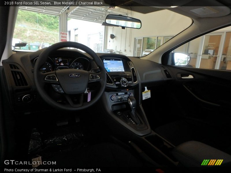 Blue Metallic / Charcoal Black 2018 Ford Focus SEL Sedan