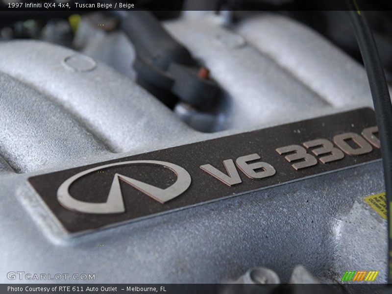 Tuscan Beige / Beige 1997 Infiniti QX4 4x4
