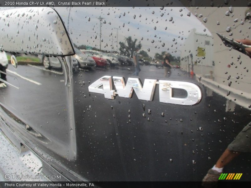 Crystal Black Pearl / Black 2010 Honda CR-V LX AWD