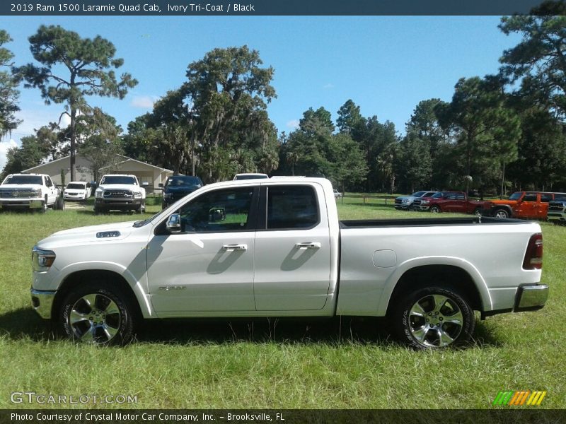  2019 1500 Laramie Quad Cab Ivory Tri–Coat