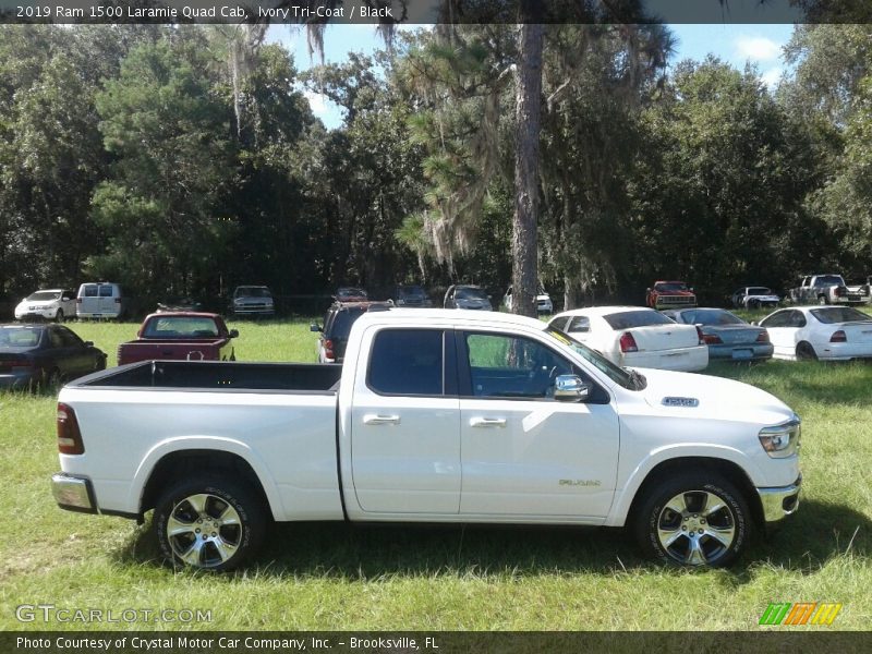 Ivory Tri–Coat / Black 2019 Ram 1500 Laramie Quad Cab