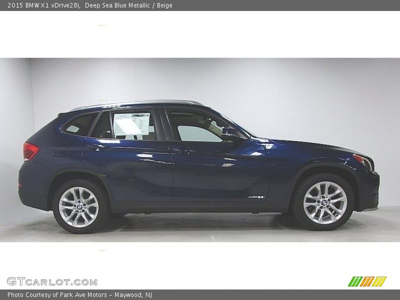 Deep Sea Blue Metallic / Beige 2015 BMW X1 xDrive28i