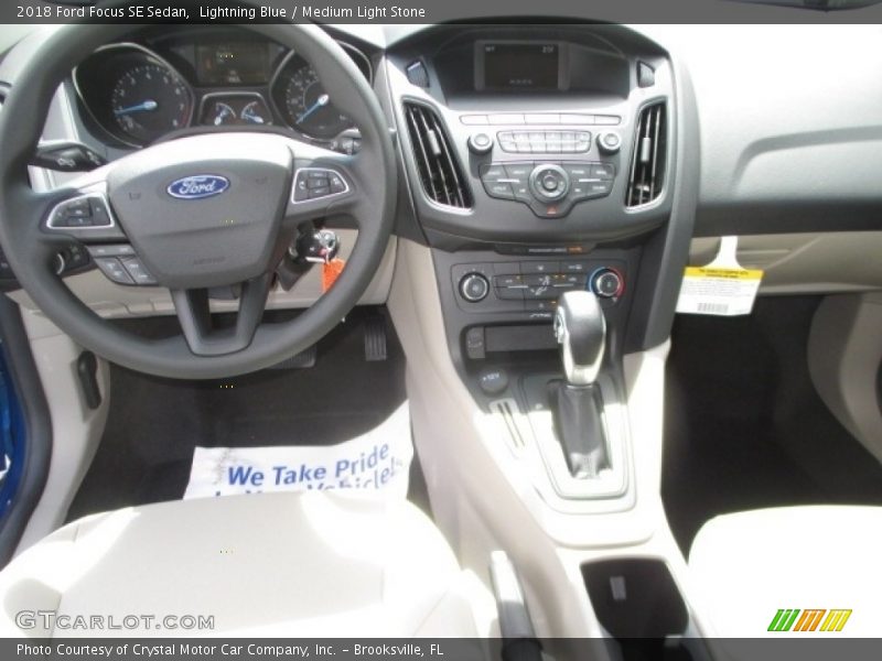 Lightning Blue / Medium Light Stone 2018 Ford Focus SE Sedan