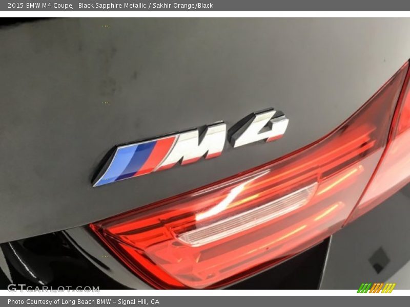 Black Sapphire Metallic / Sakhir Orange/Black 2015 BMW M4 Coupe