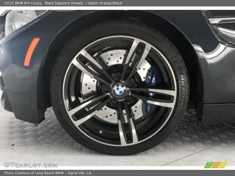 Black Sapphire Metallic / Sakhir Orange/Black 2015 BMW M4 Coupe