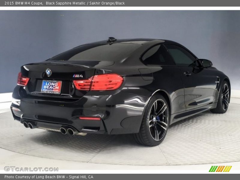 Black Sapphire Metallic / Sakhir Orange/Black 2015 BMW M4 Coupe