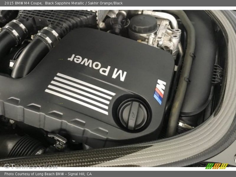 Black Sapphire Metallic / Sakhir Orange/Black 2015 BMW M4 Coupe