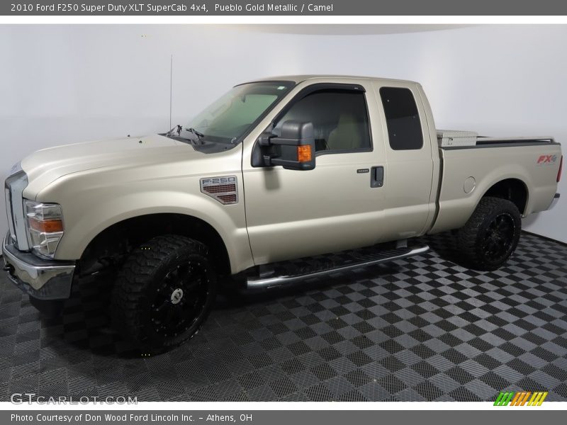 Pueblo Gold Metallic / Camel 2010 Ford F250 Super Duty XLT SuperCab 4x4