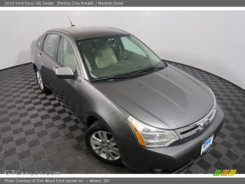 Sterling Grey Metallic / Medium Stone 2010 Ford Focus SEL Sedan