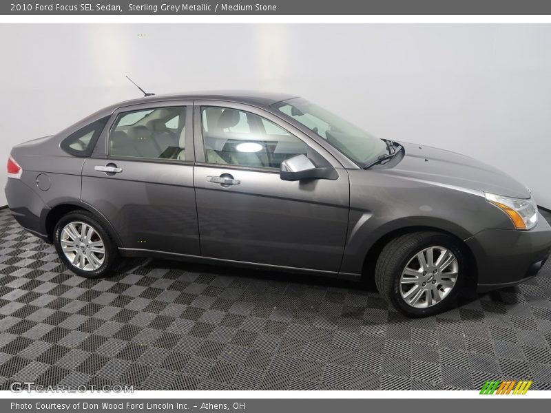 Sterling Grey Metallic / Medium Stone 2010 Ford Focus SEL Sedan