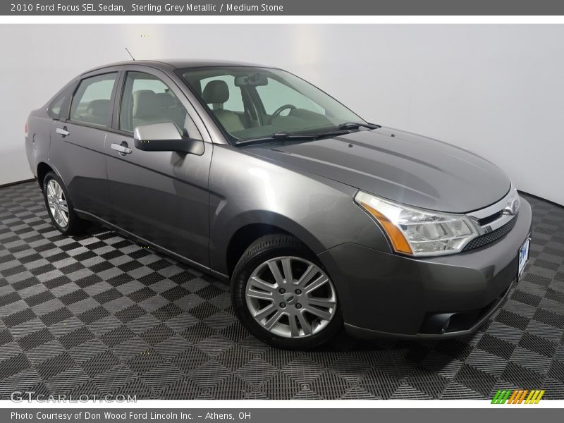 Sterling Grey Metallic / Medium Stone 2010 Ford Focus SEL Sedan