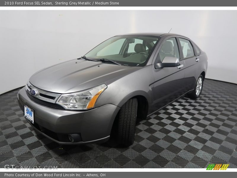 Sterling Grey Metallic / Medium Stone 2010 Ford Focus SEL Sedan