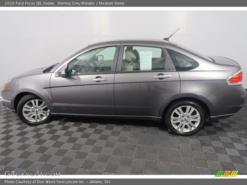 Sterling Grey Metallic / Medium Stone 2010 Ford Focus SEL Sedan