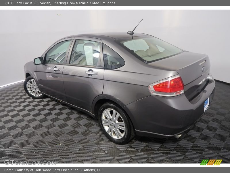Sterling Grey Metallic / Medium Stone 2010 Ford Focus SEL Sedan