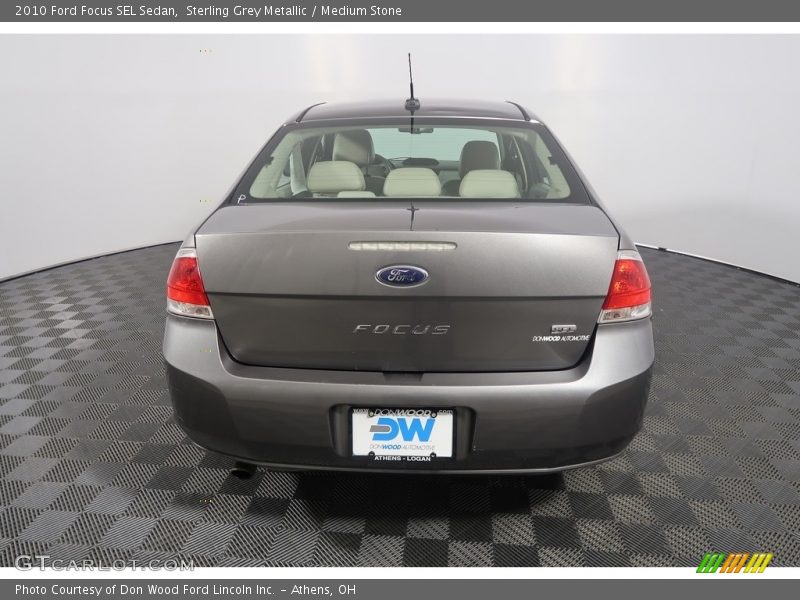 Sterling Grey Metallic / Medium Stone 2010 Ford Focus SEL Sedan