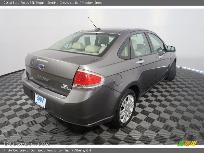 Sterling Grey Metallic / Medium Stone 2010 Ford Focus SEL Sedan