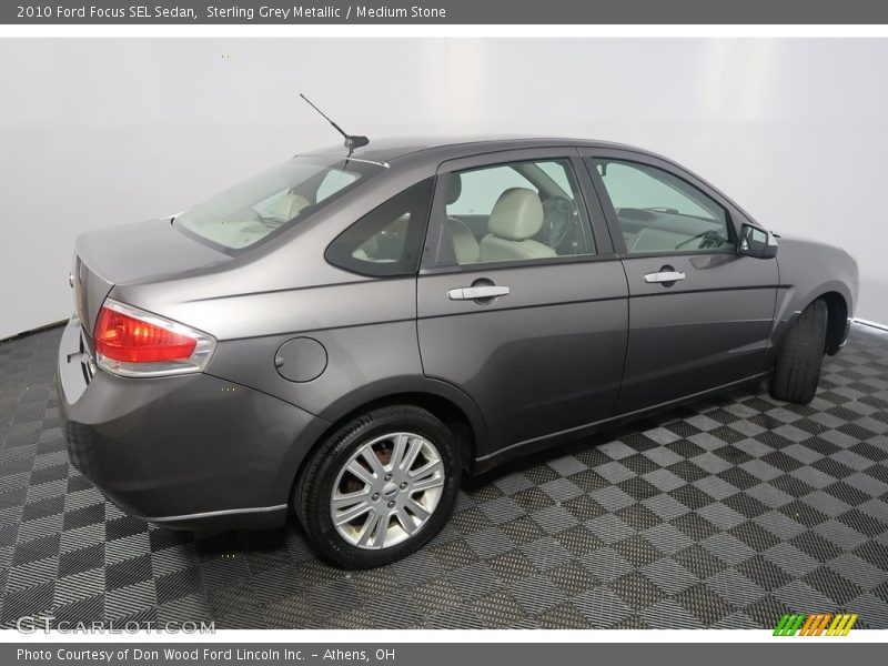 Sterling Grey Metallic / Medium Stone 2010 Ford Focus SEL Sedan