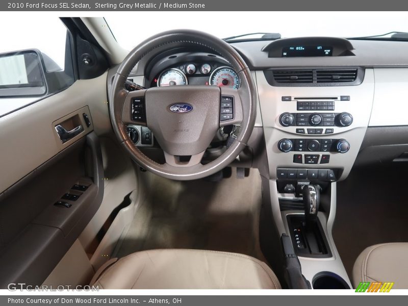 Sterling Grey Metallic / Medium Stone 2010 Ford Focus SEL Sedan